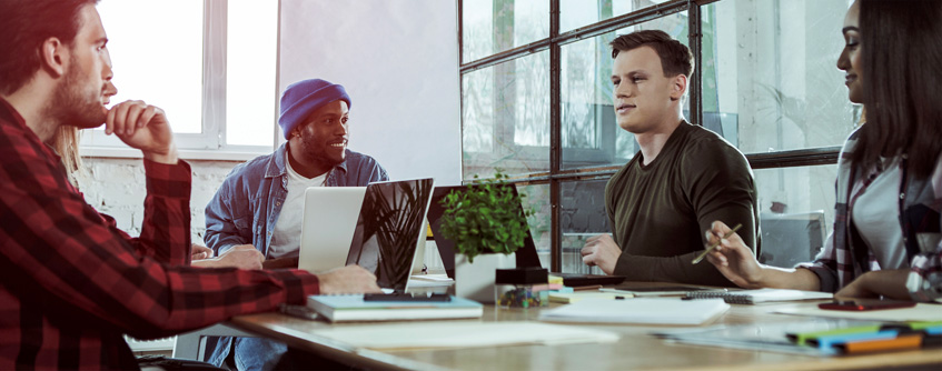 5 coworkers in a meeting